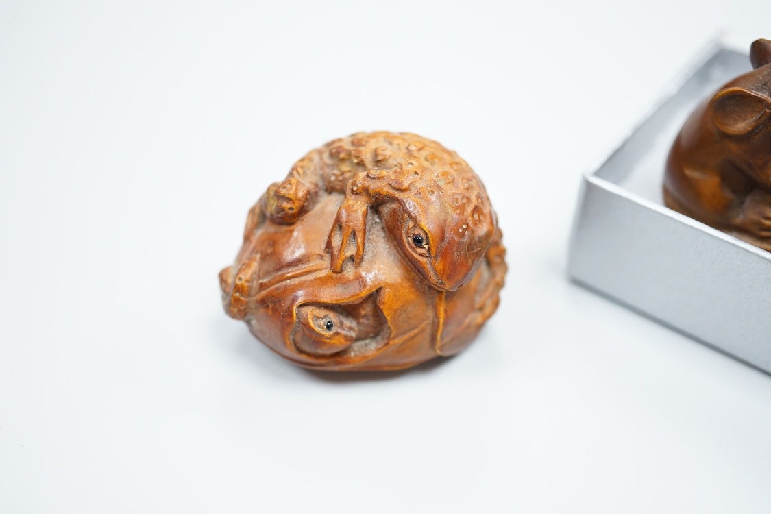 Three carved hardwood netsuke, signed